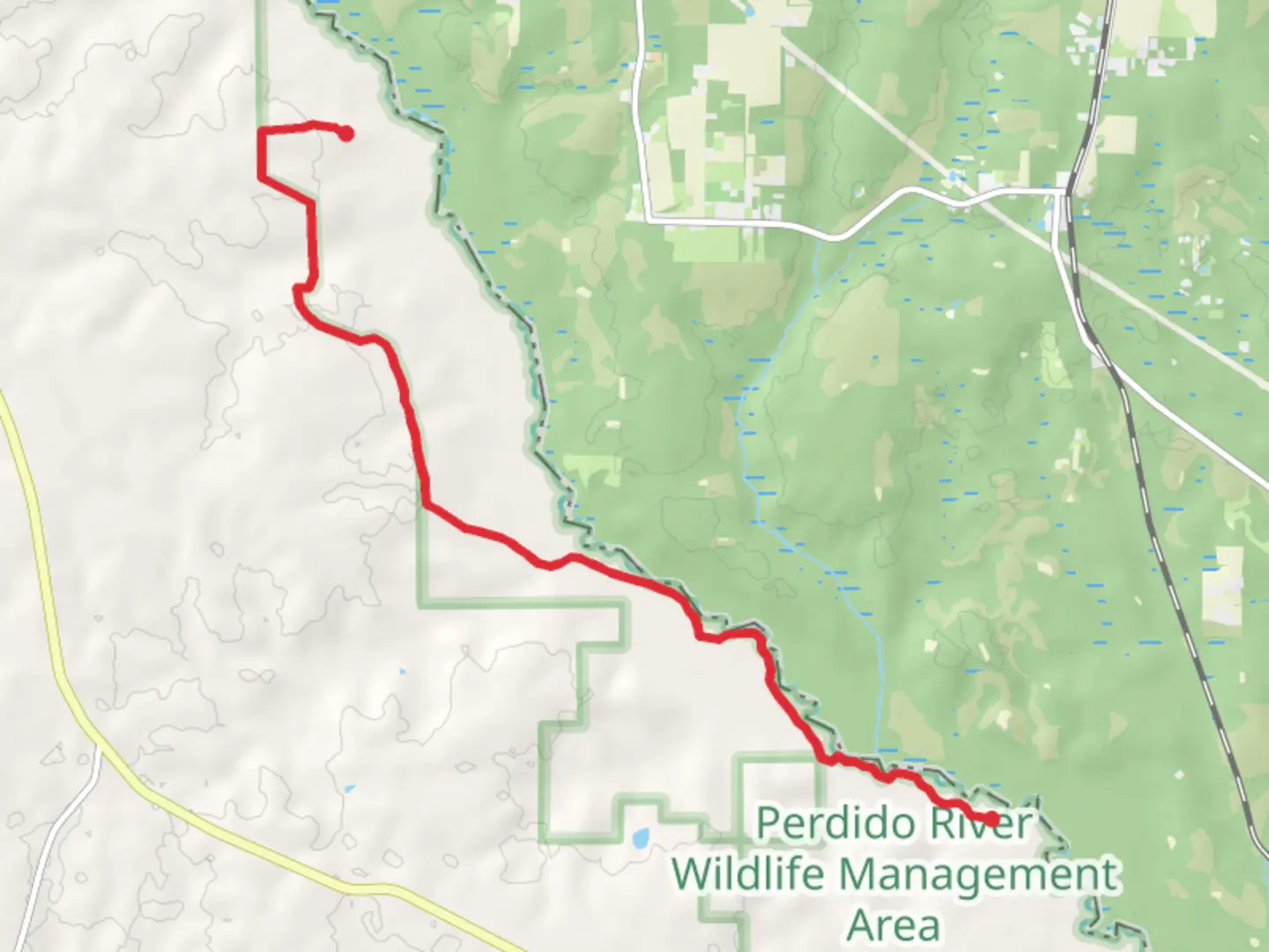An image depicting the trail Perdido Trail and River Road and its surrounding area.