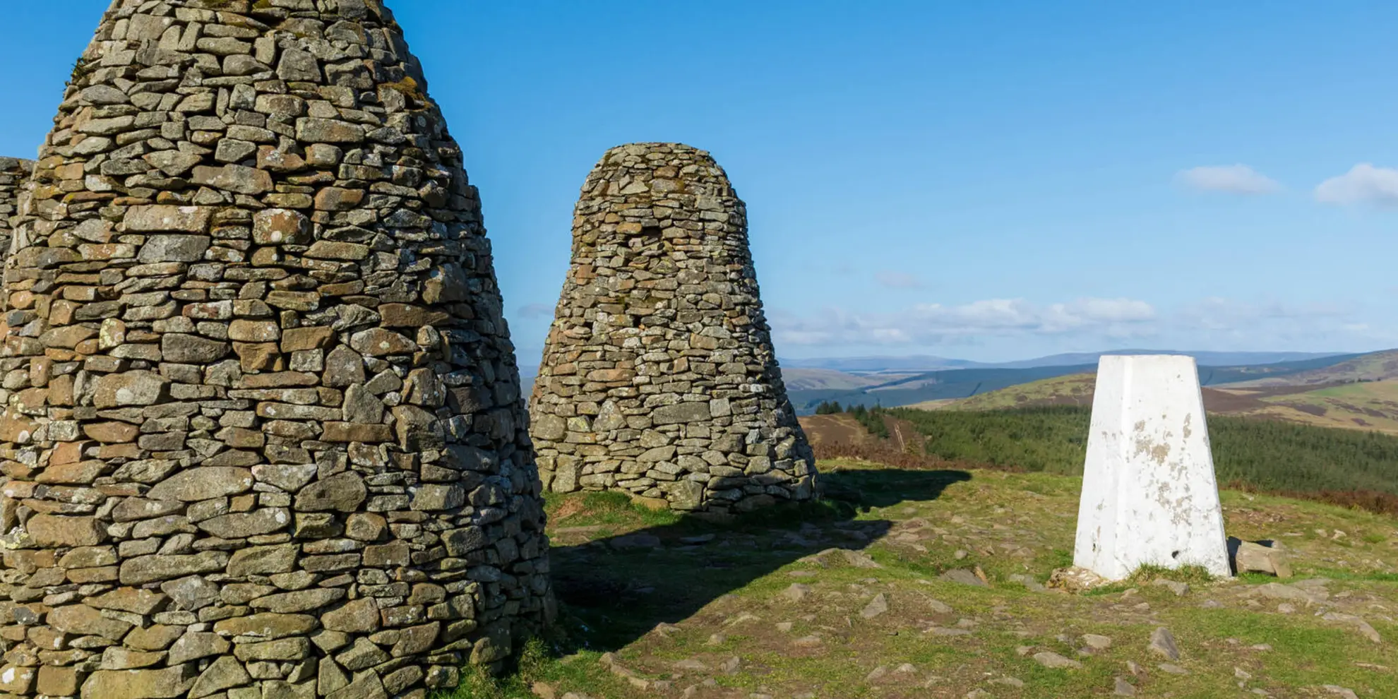 An image depicting the trail Yarrowford - Three Brethren - Brown Knowe Trail and its surrounding area.