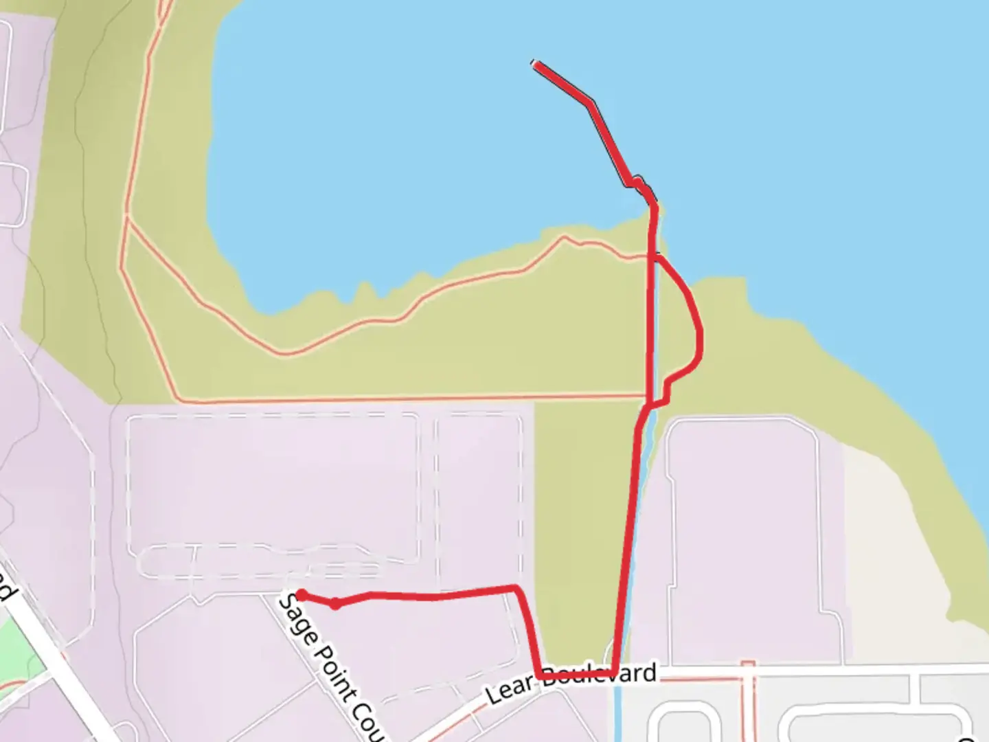 An image depicting the trail Swan Lake from Sage Point Court and its surrounding area.