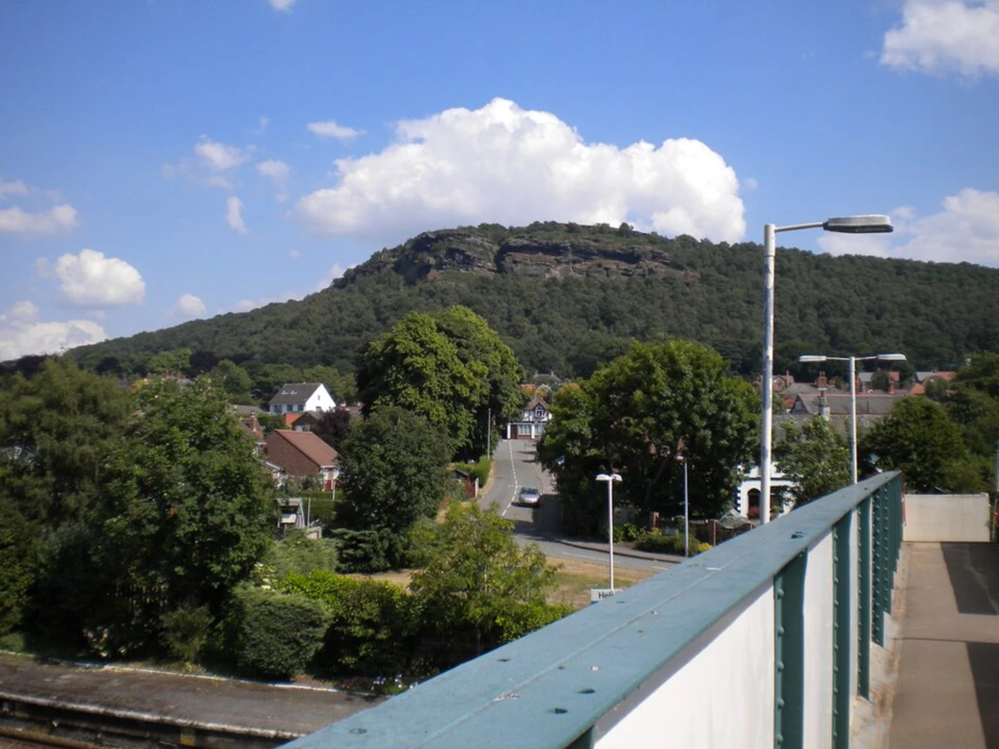 An image depicting the trail Harmer's Wood, Woodhouse Hill and Helsby Hill and its surrounding area.