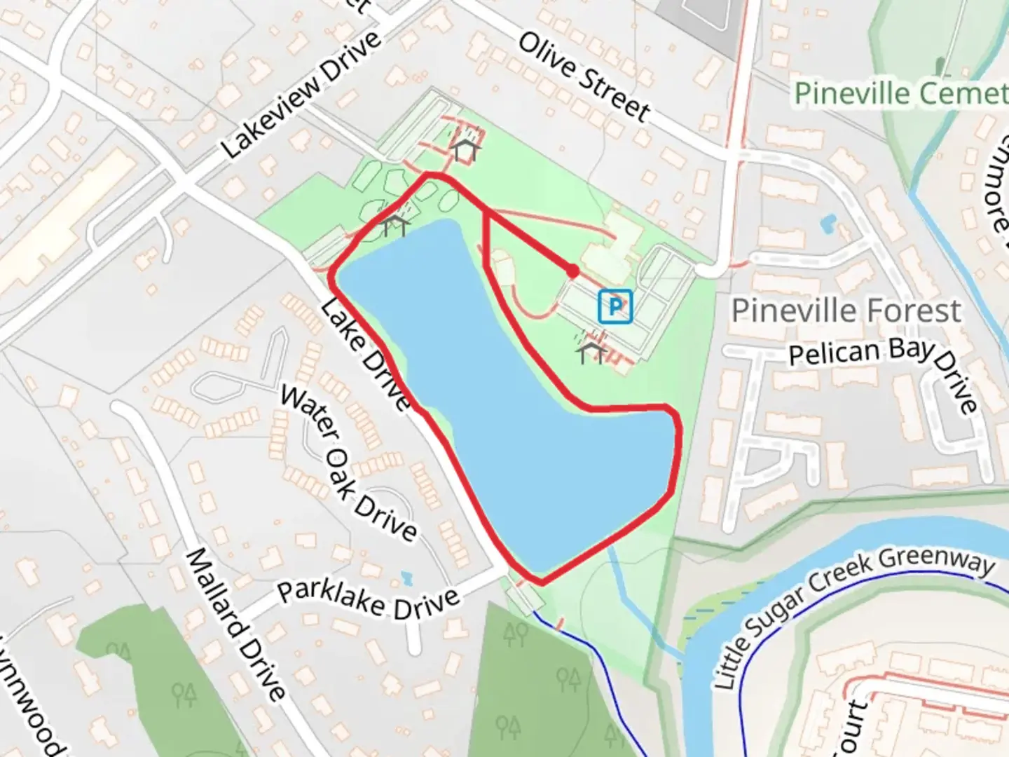 An image depicting the trail Pineville Lake Park Loop and its surrounding area.