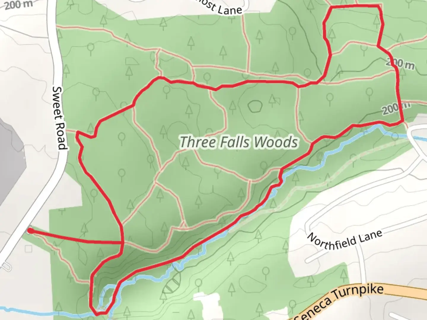 An image depicting the trail Three Falls Woods Loop and its surrounding area.