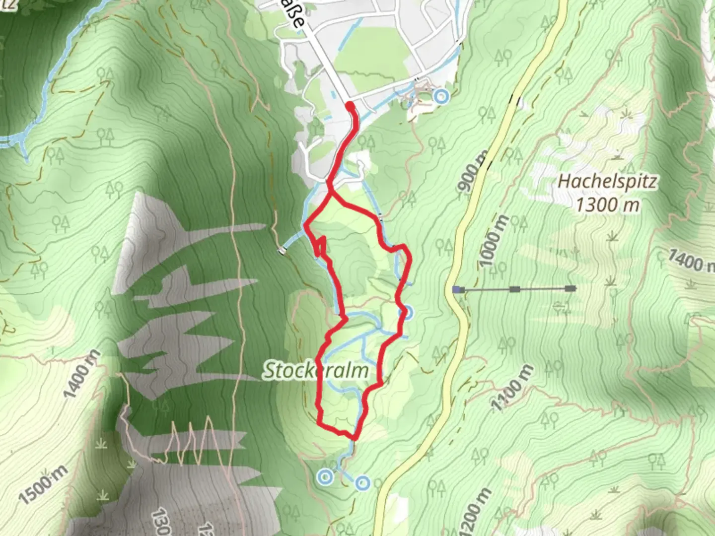 An image depicting the trail Stockeralm and Josefstaler Wasserfaelle via Alte Spitzingstraße and its surrounding area.
