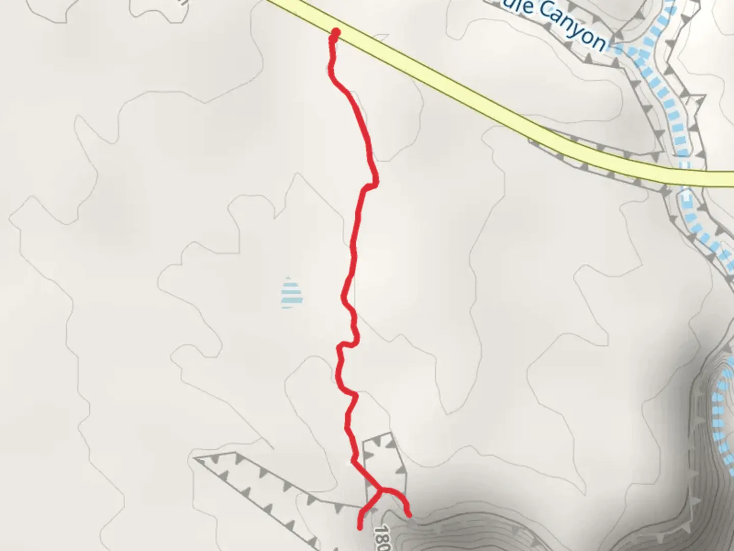 An image depicting the trail Mule Canyon Cave Towers and its surrounding area.