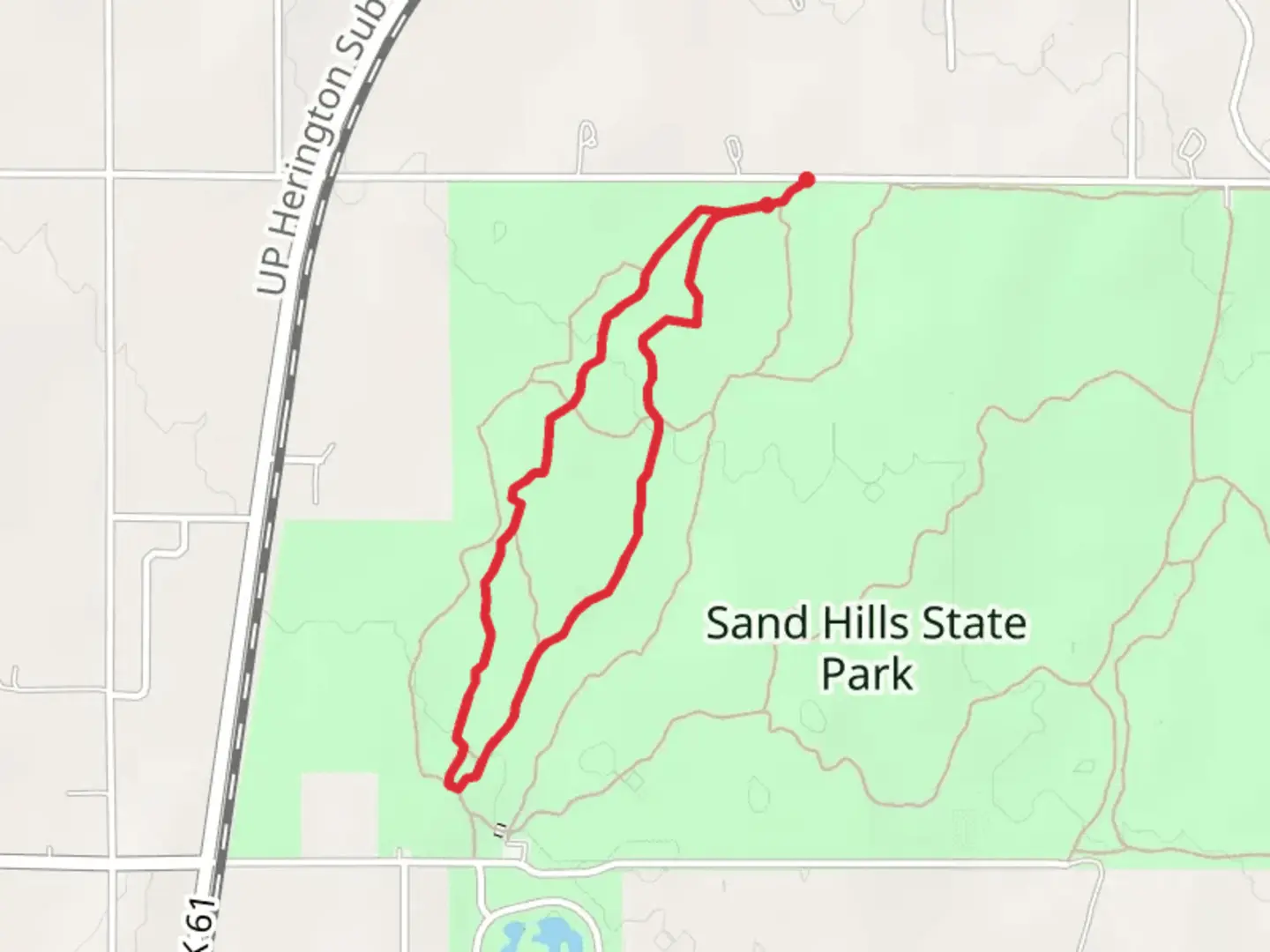 An image depicting the trail East 69th Avenue South Loop - Sand Hills State Park and its surrounding area.