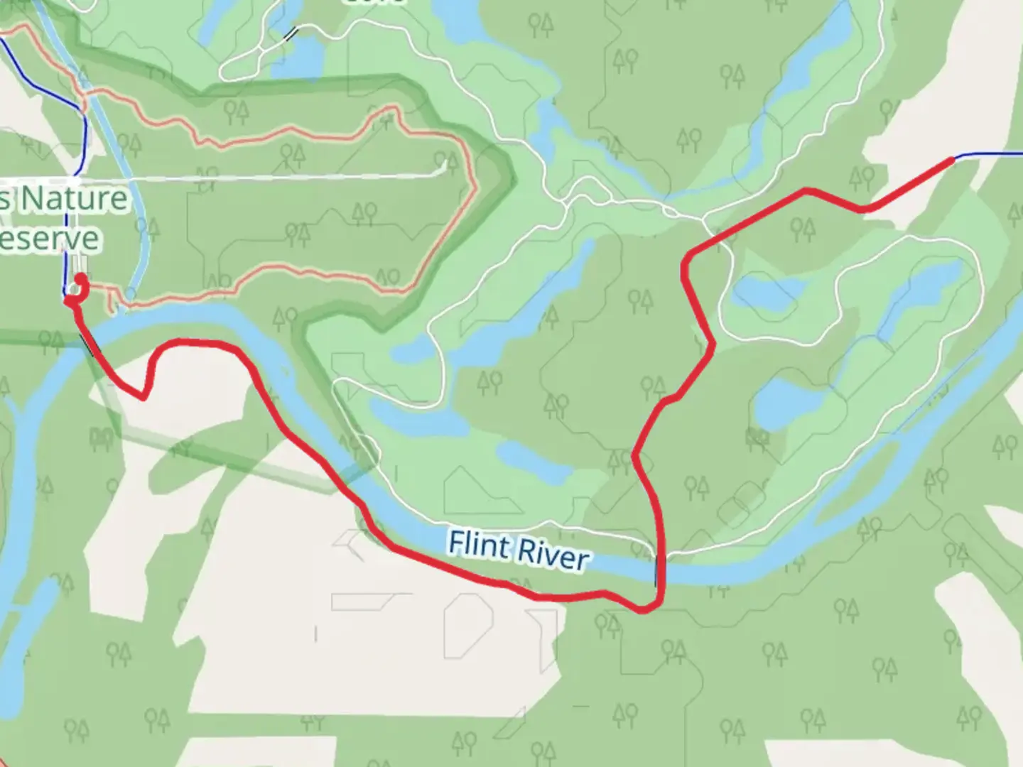 An image depicting the trail Flint River Greenway and Big Cove Greenway and its surrounding area.