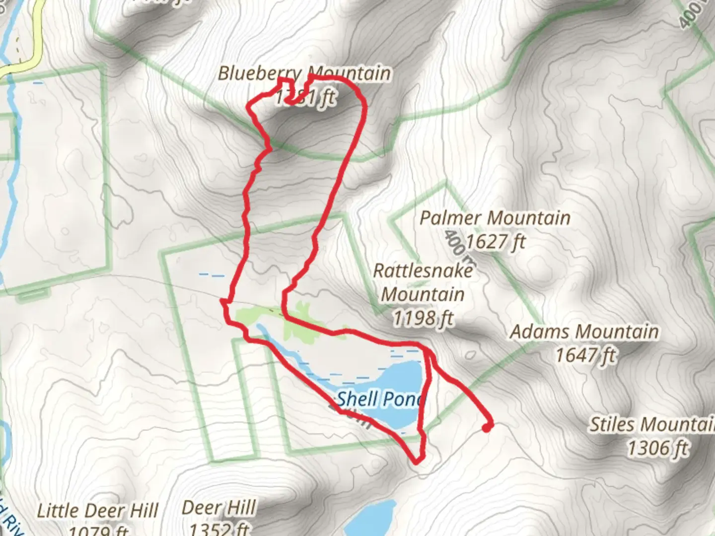 An image depicting the trail Blueberry Mountain from Shell Pond and its surrounding area.