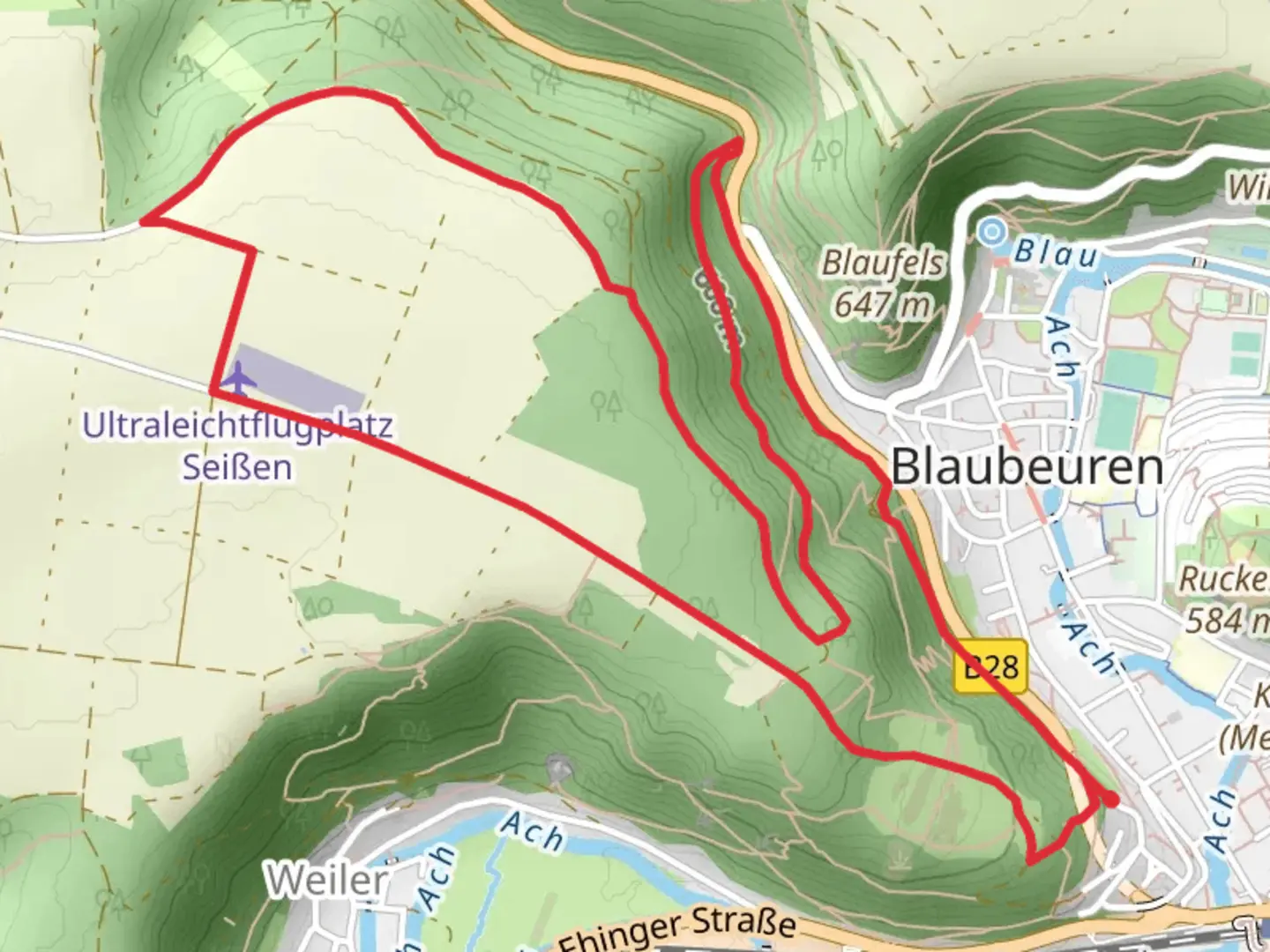 An image depicting the trail Blaubeurer Felsenstieg and its surrounding area.