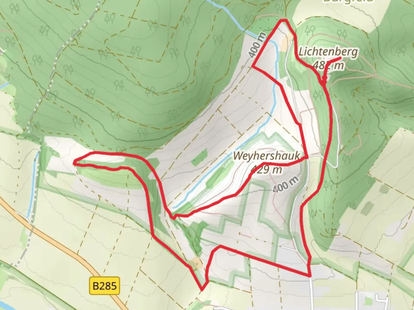 An image depicting the trail Lichtenburg and Weyhershauk Loop via Extratour Ostheimer and its surrounding area.