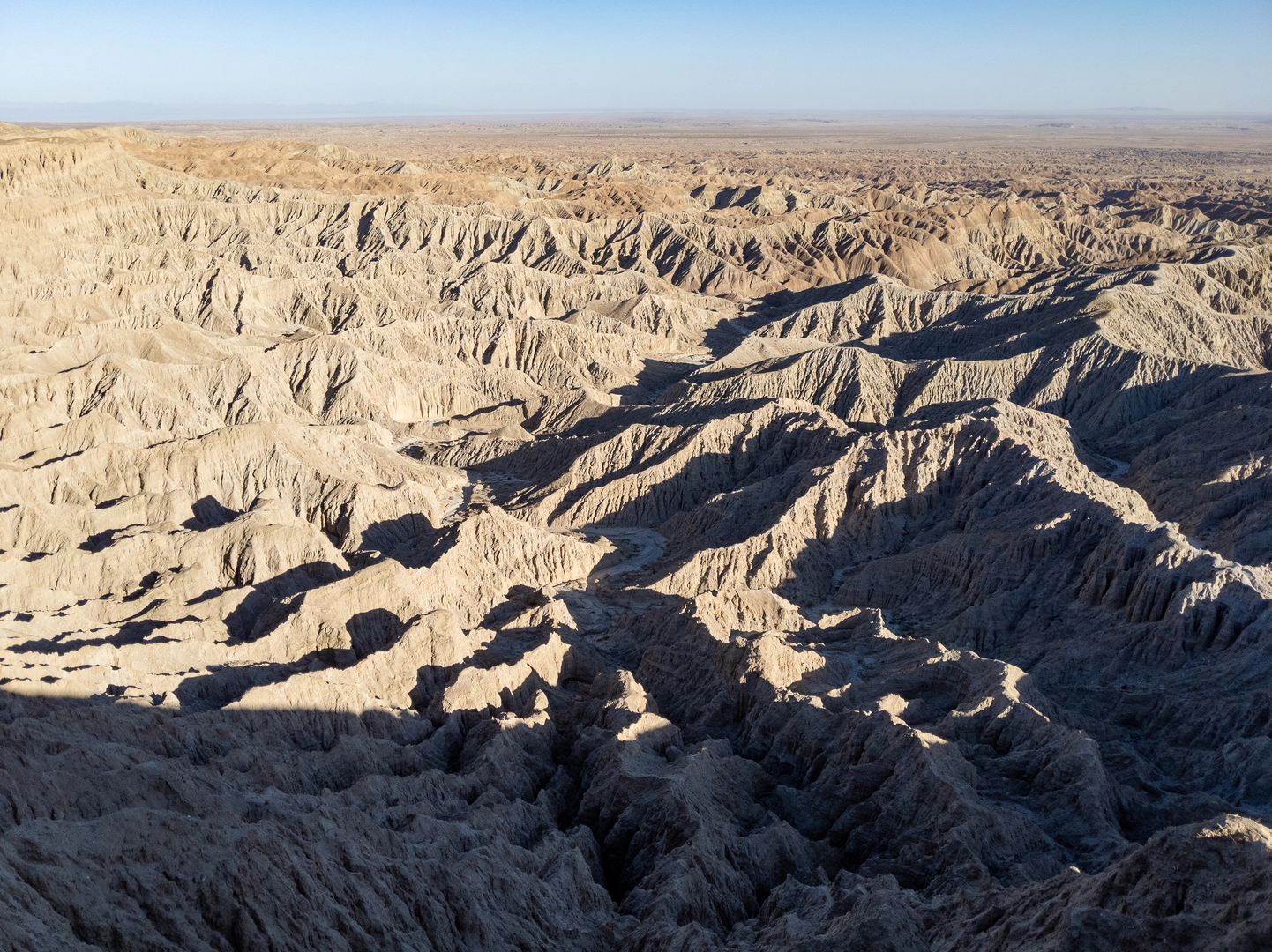 An image depicting the trail Pinyon Mountain Road and Hapaha Flat Road and its surrounding area.
