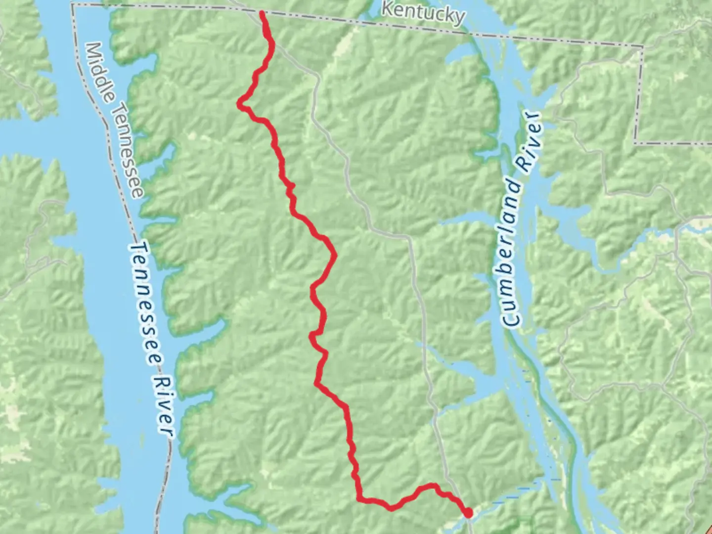 An image depicting the trail Round Top - North - South Trail and its surrounding area.