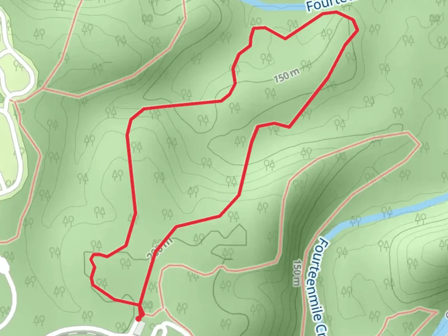 An image depicting the trail Charlestown State Park Short Loop and its surrounding area.