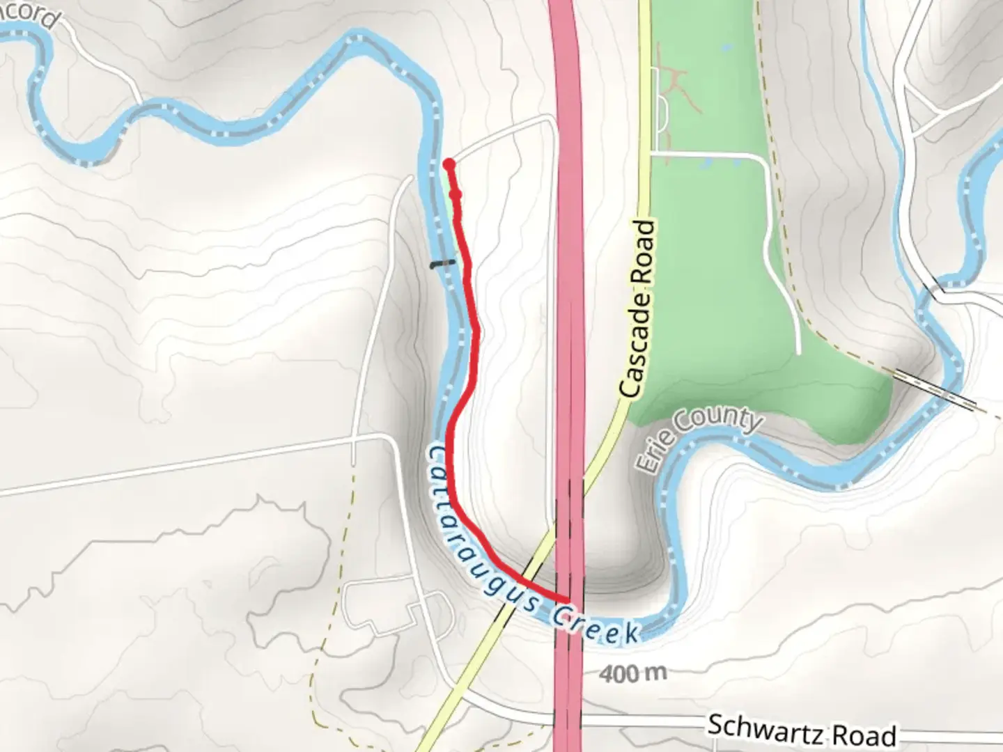 An image depicting the trail Cattaraugus Creek in Scoby Dam Park and its surrounding area.