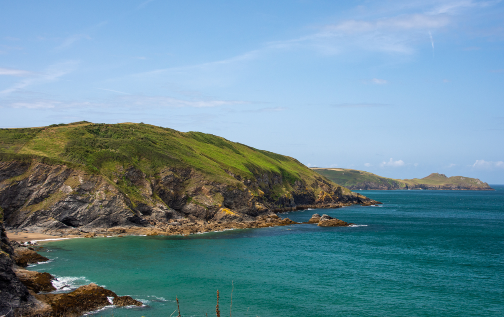 An image depicting the trail Lundy Bay and Pennywilgie Point Walk and its surrounding area.