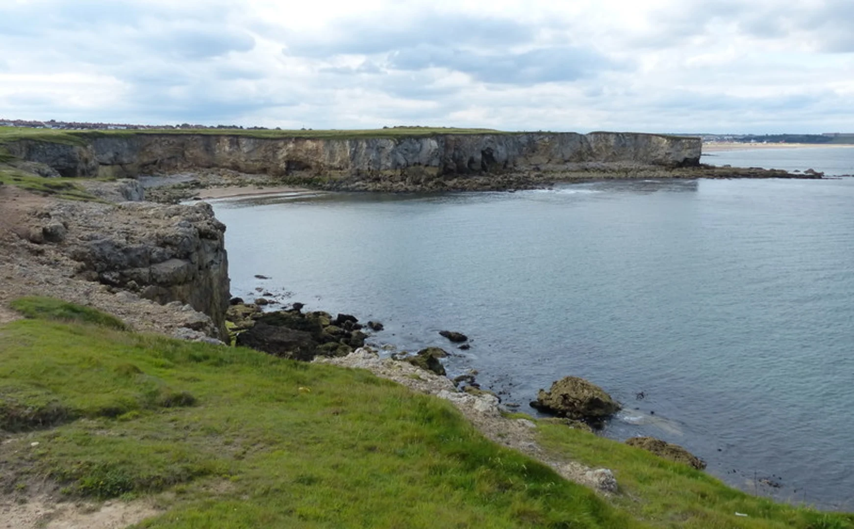 An image depicting the trail Lizard Point, Marsden Rock and Frenchman's Bay via England Coast Path and its surrounding area.
