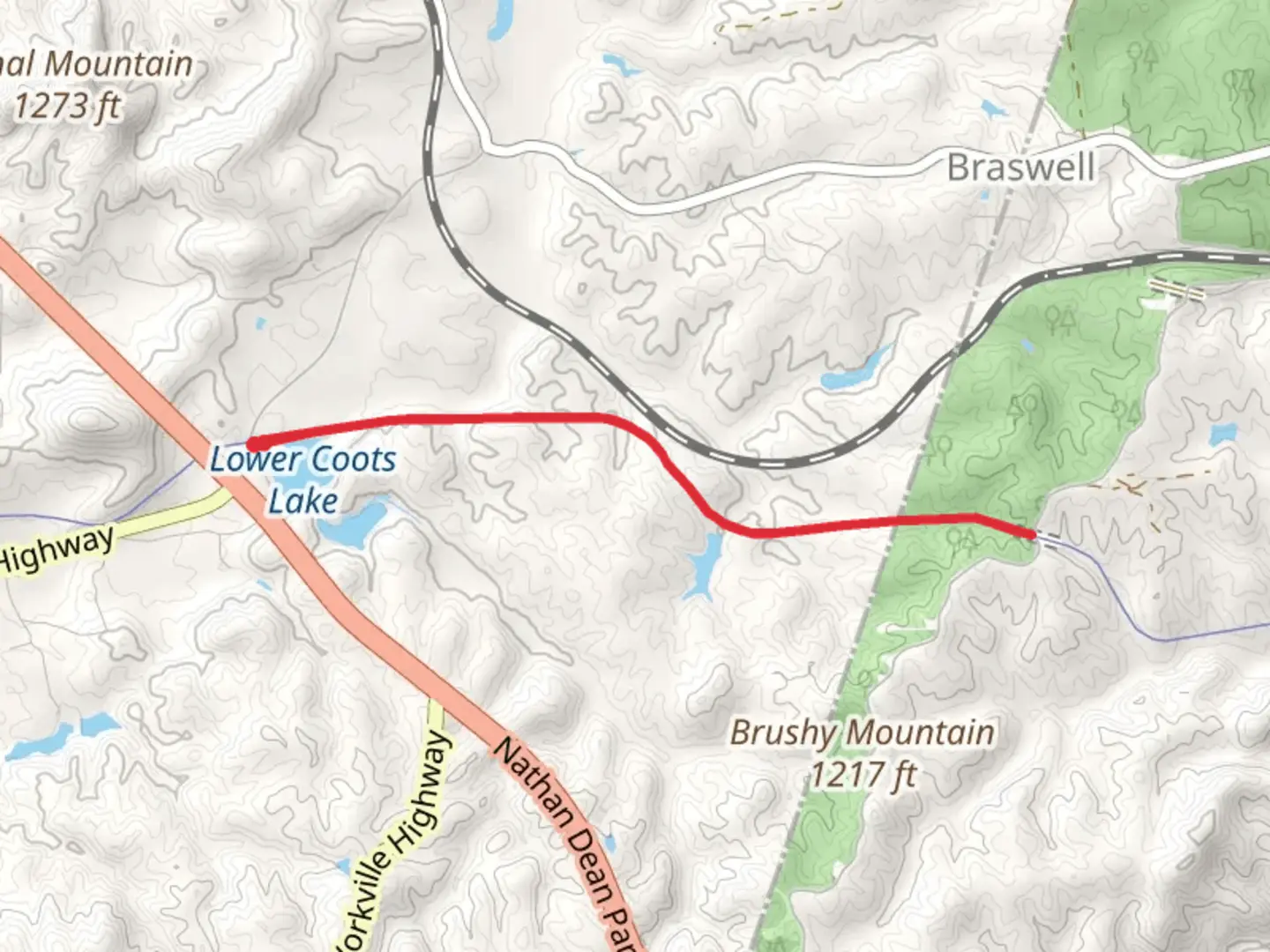 An image depicting the trail Silver Comet Trail from Lower Coots Lake and its surrounding area.