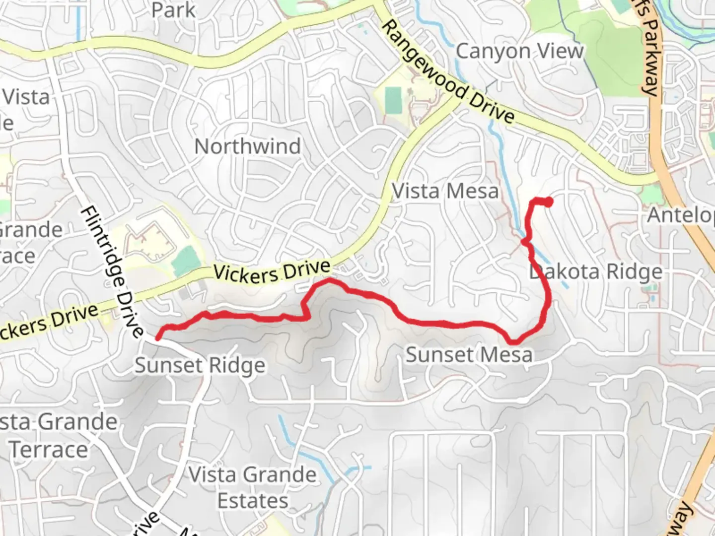 An image depicting the trail Sunset Mesa Open Space and its surrounding area.
