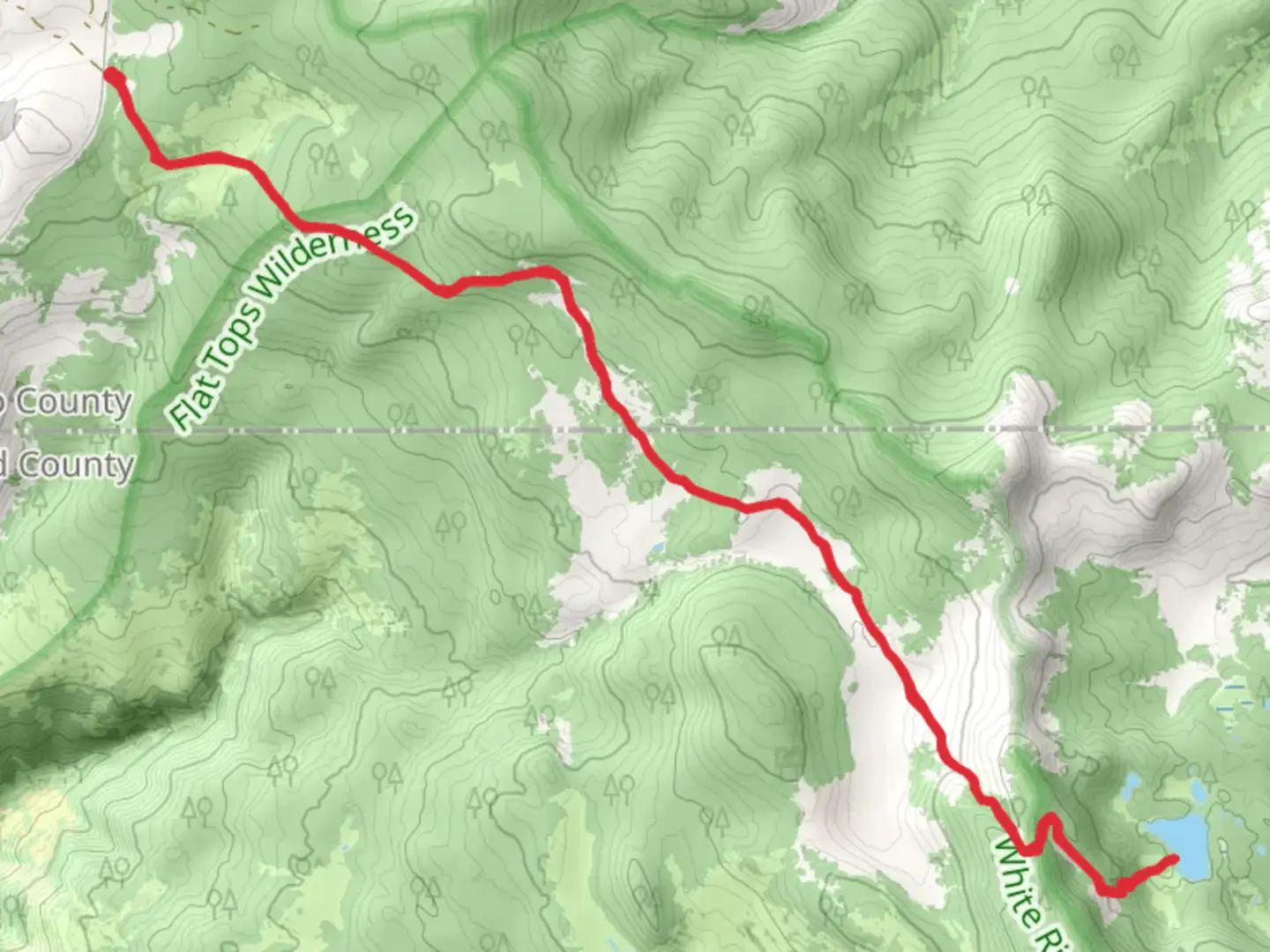 An image depicting the trail Chinese Wall Trail and West Lost Lake Trail and its surrounding area.