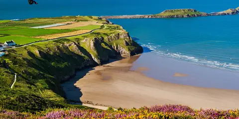An image depicting the trail Harding's Down and Rhossili Down from Rhossili and its surrounding area.