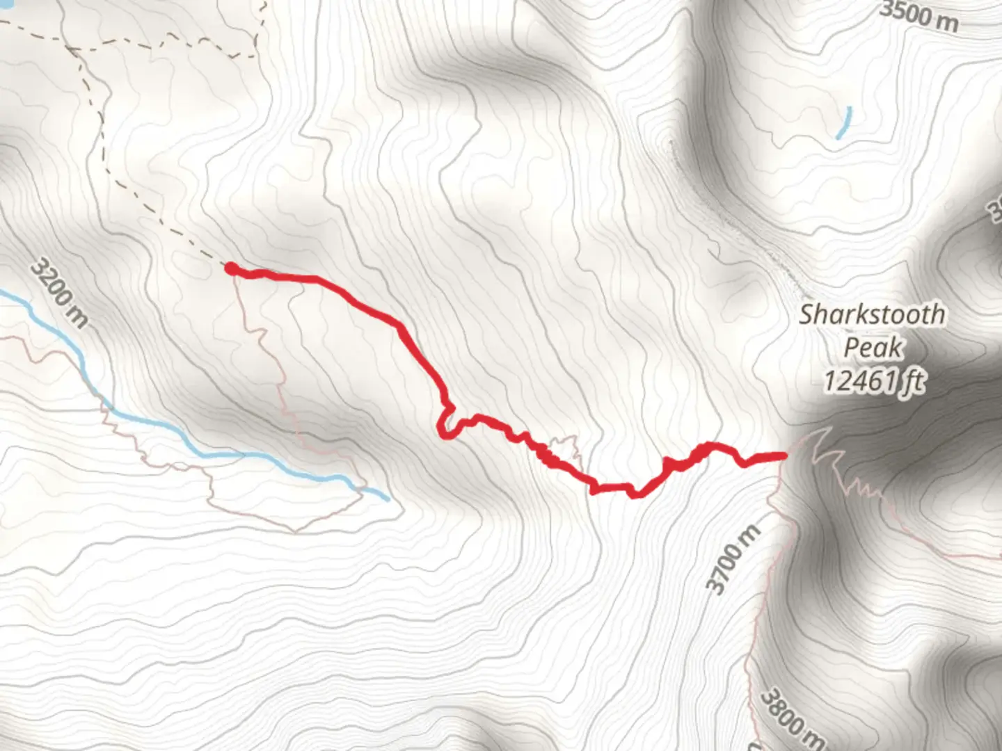 An image depicting the trail Sharkstooth Pass and its surrounding area.