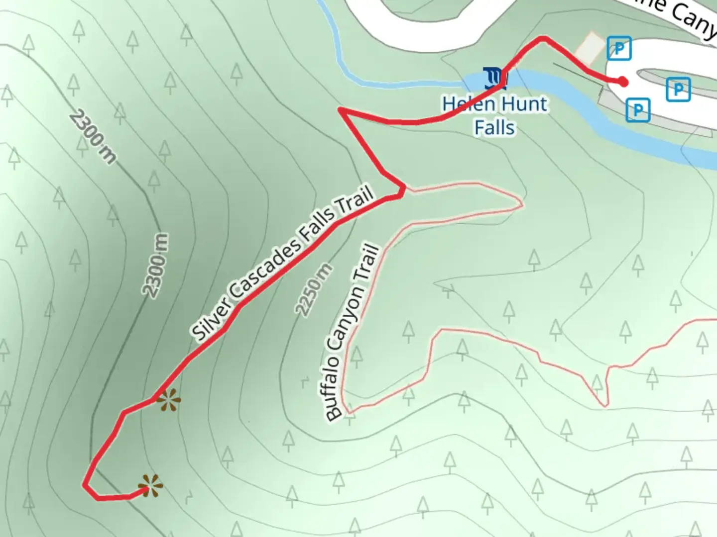 An image depicting the trail Silver Cascades Falls Trail and its surrounding area.