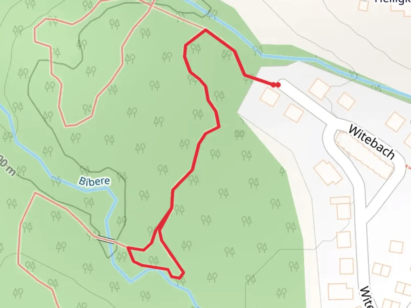 An image depicting the trail Barfusspfad Heiligkreuz and its surrounding area.