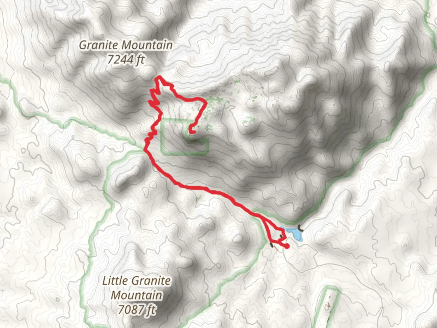 An image depicting the trail Granite Basin Lake and Granite Mountain Trail 261 and its surrounding area.