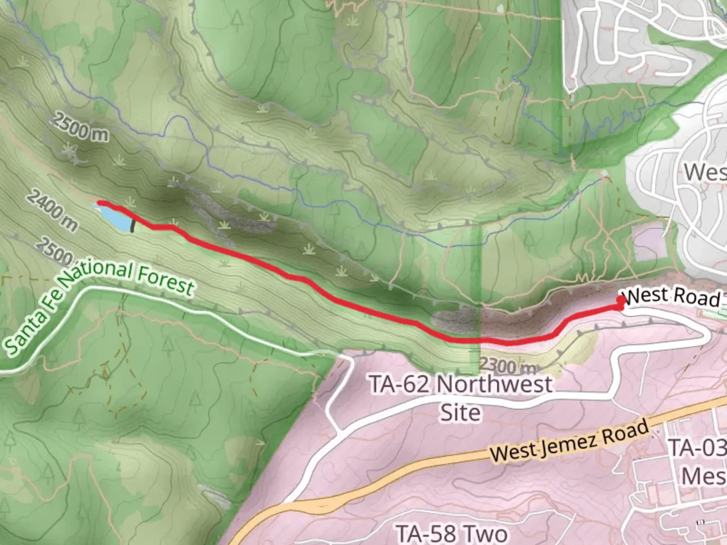 An image depicting the trail Los Alamos Reservoir and its surrounding area.