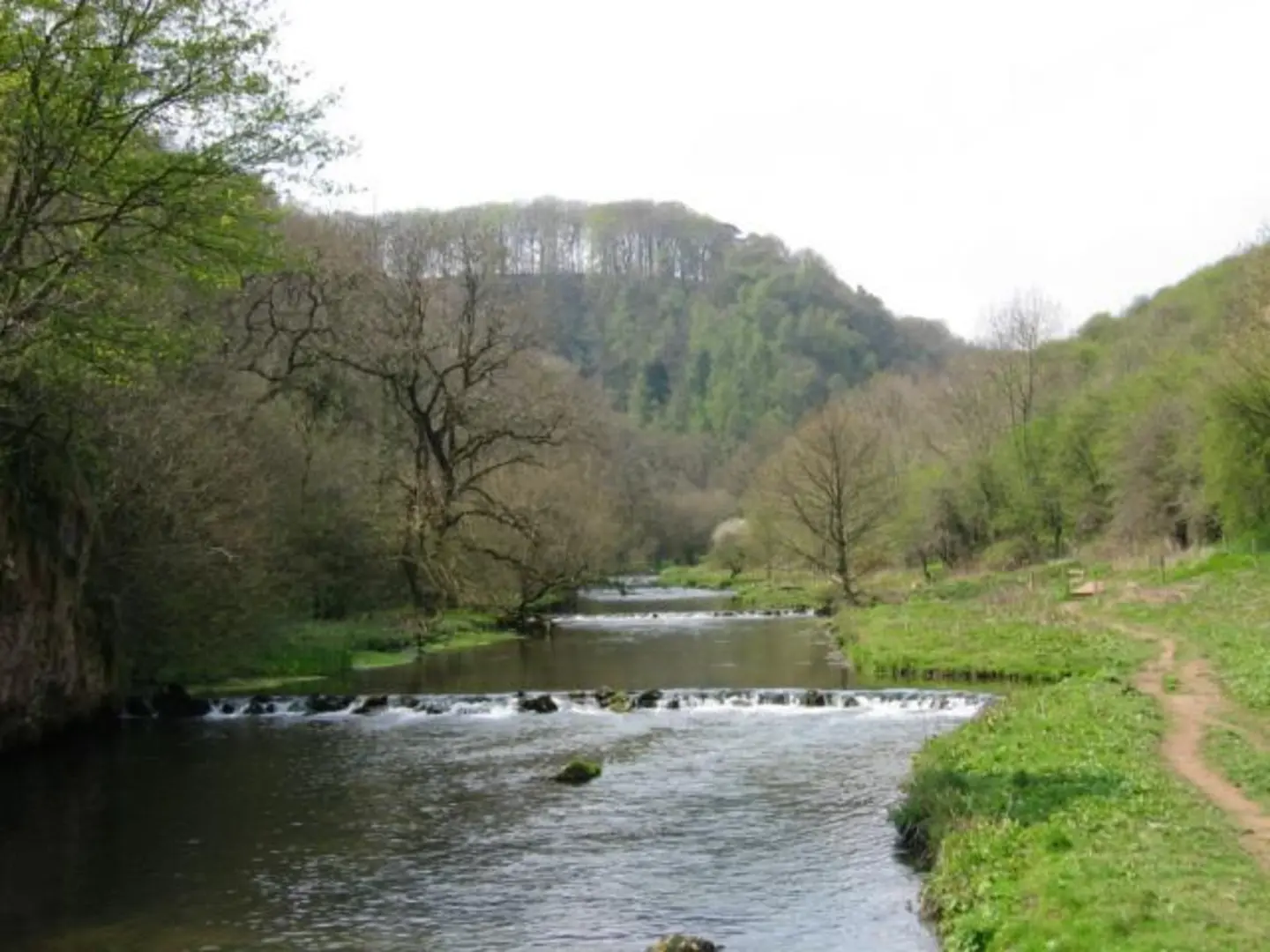 An image depicting the trail Tideswell Dale Loop via Monsal Trail and its surrounding area.