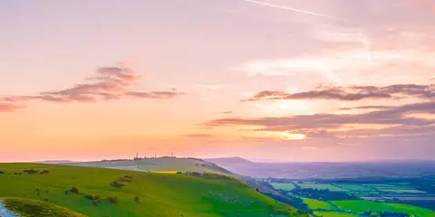 An image depicting the trail Edburton Hill and Devil's Dyke from Saddlescombe and its surrounding area.