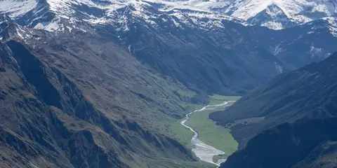 An image depicting the trail West Matukituki Track and its surrounding area.