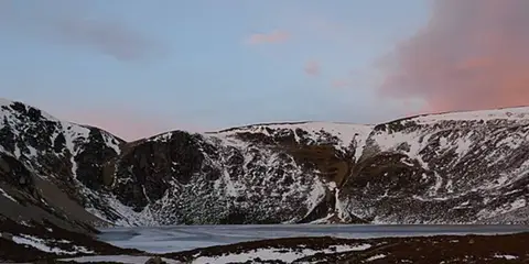 An image depicting the trail Glen Clova Path - Loch Brandy and its surrounding area.