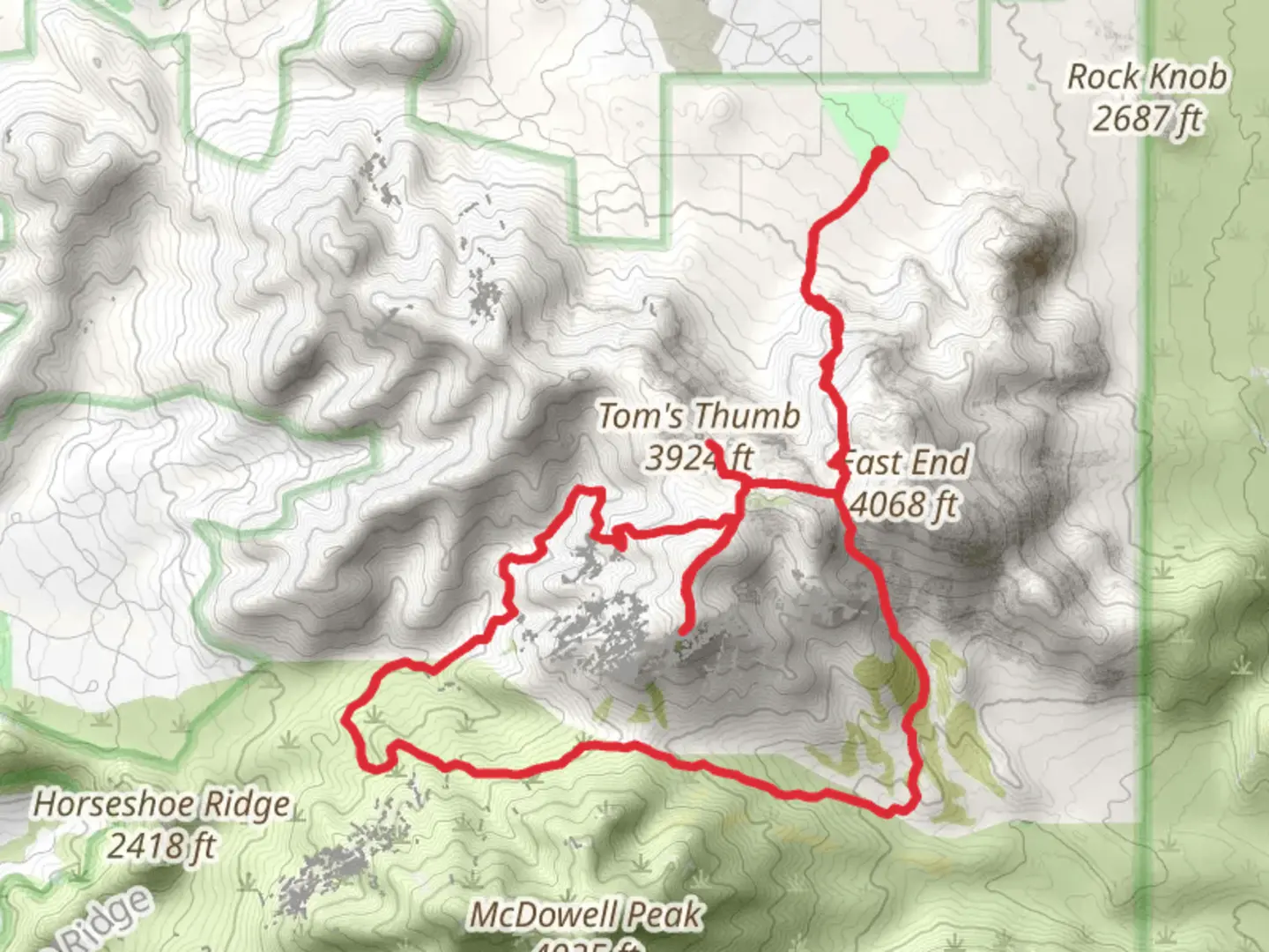 An image depicting the trail Tom's Thumb and East End Loop TrailLoop and its surrounding area.