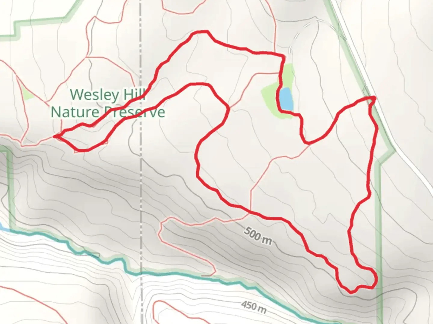 An image depicting the trail Wesley Hill Nature Loop Trail and its surrounding area.