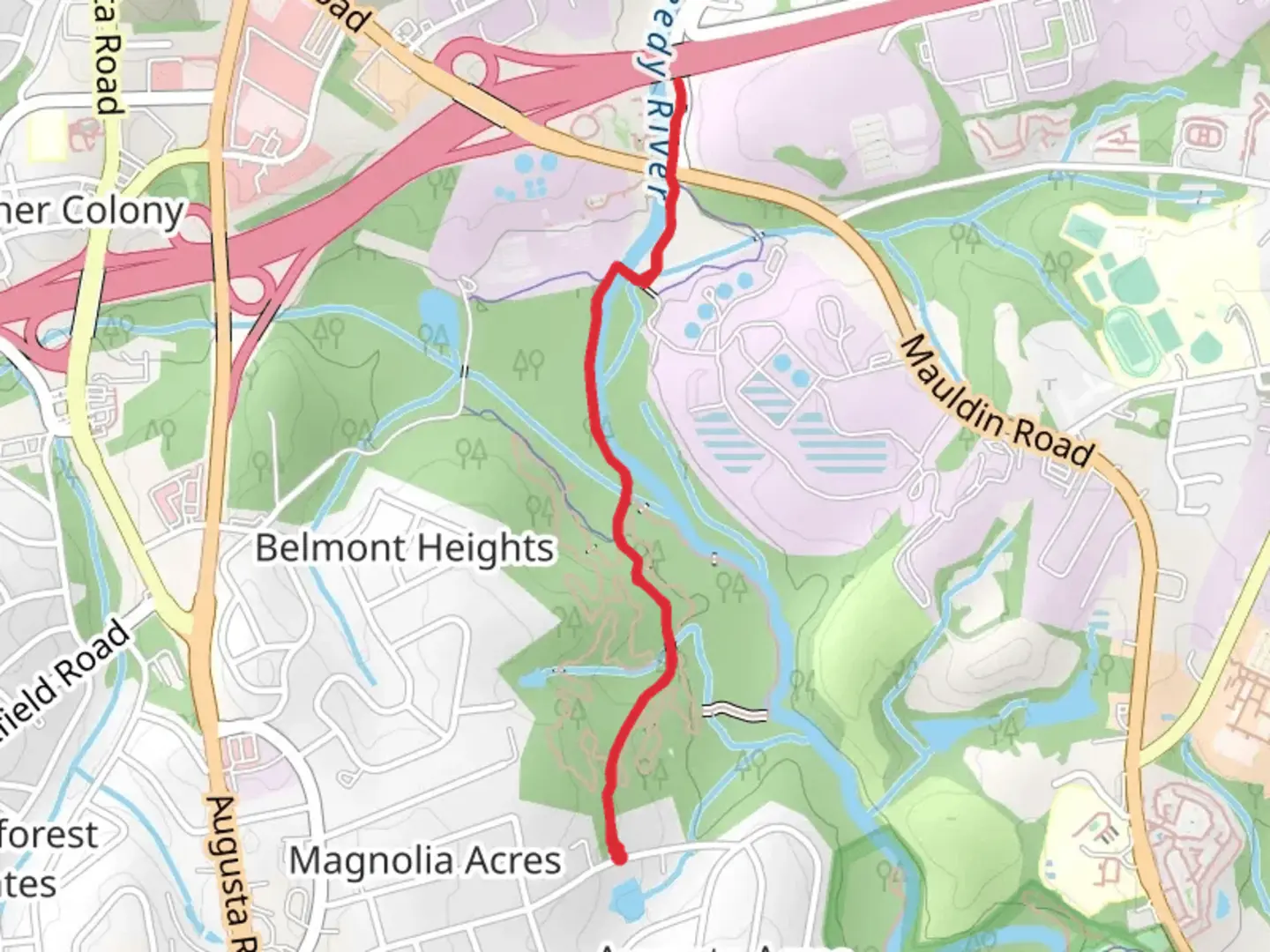 An image depicting the trail Swamp Rabbit Trail and its surrounding area.