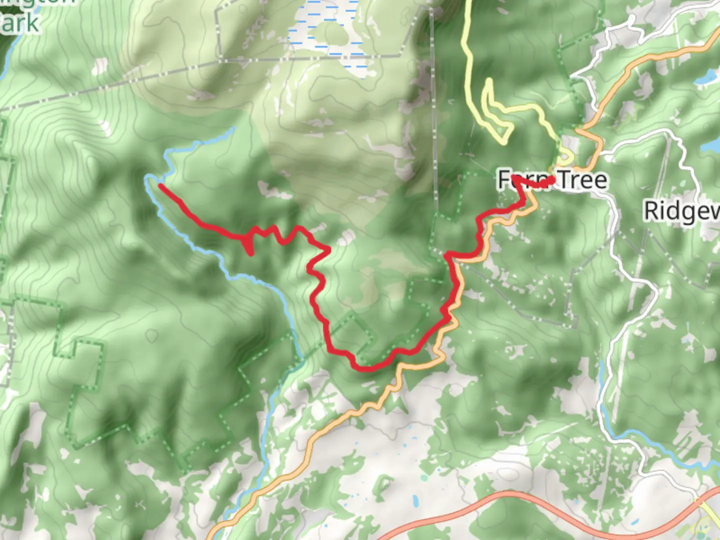 An image depicting the trail Fern Tree to Wellington Falls Trail and its surrounding area.