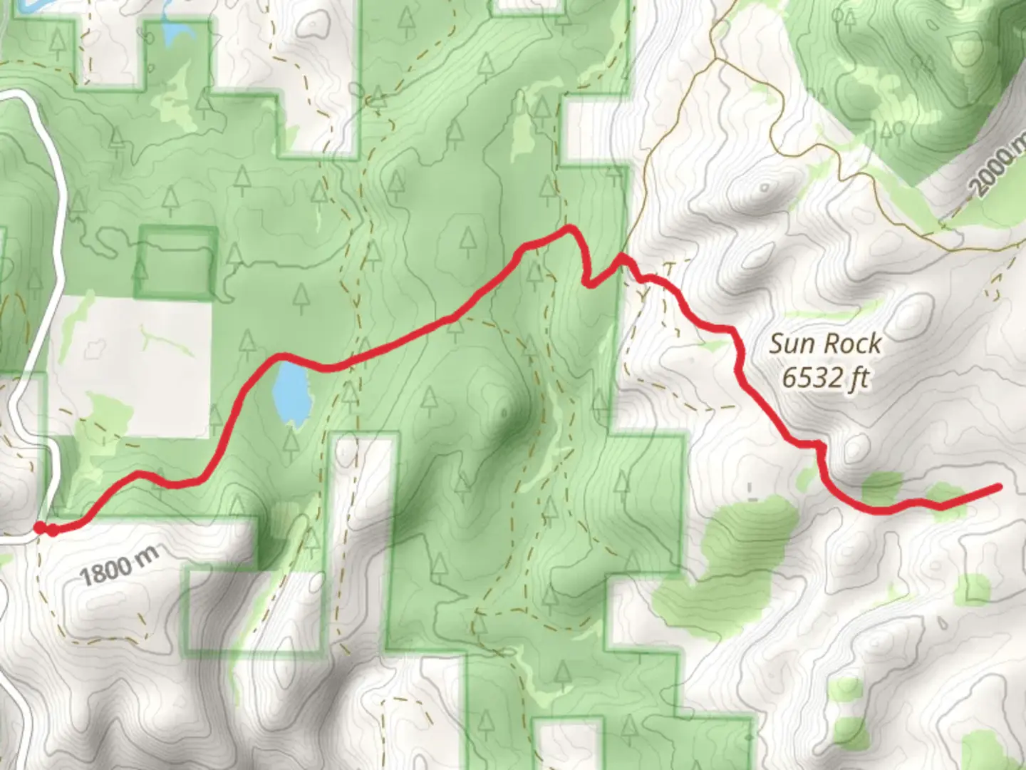 An image depicting the trail Sunrock Trail and its surrounding area.