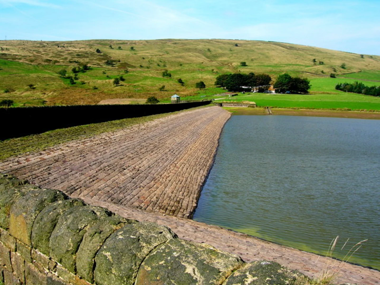 An image depicting the trail Delph and Castleshaw Lower Reservoir and its surrounding area.