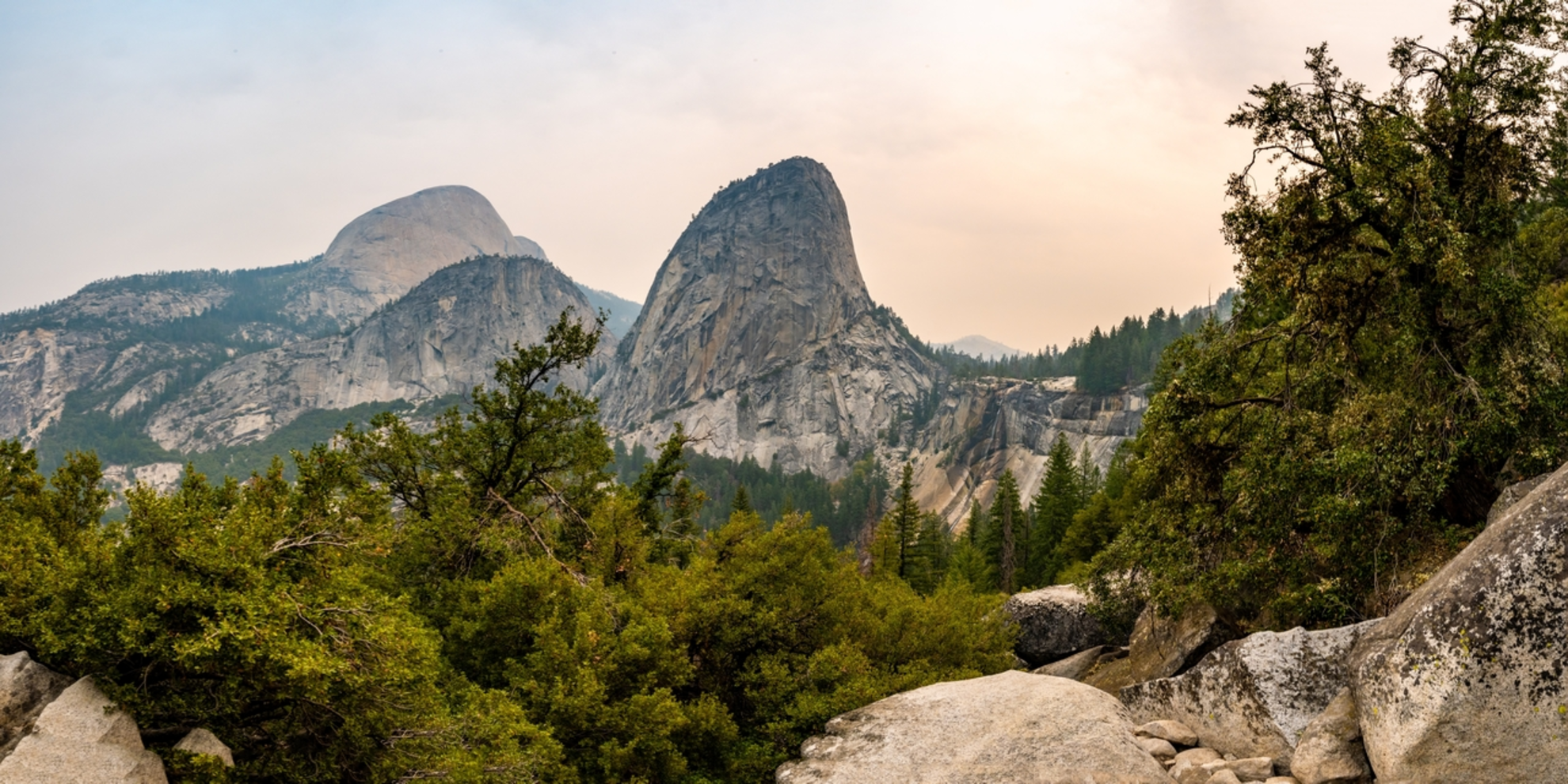 An image depicting the trail Liberty Cap, Merced River and Emerald Pool Loop and its surrounding area.
