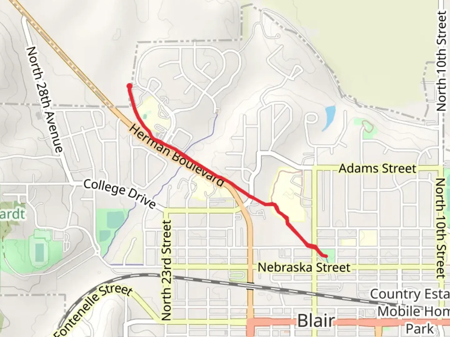 An image depicting the trail Deerfield Boulevard to Lions Club Park and its surrounding area.