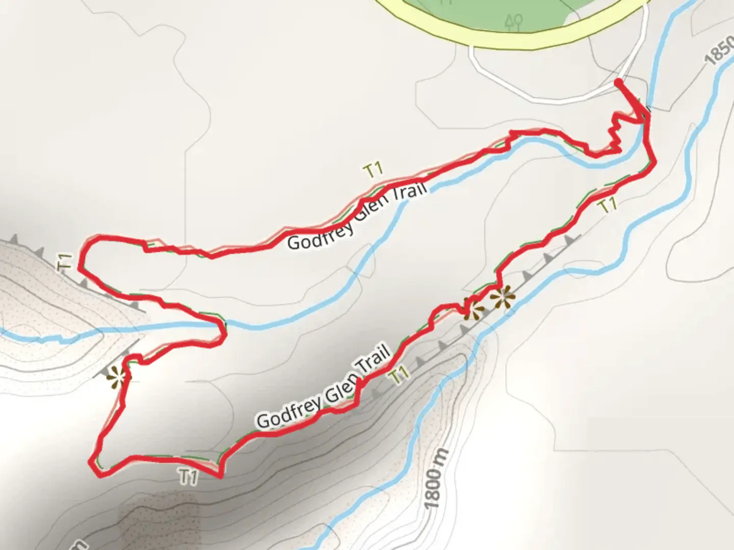 An image depicting the trail Godfrey Glen Loop Trail and its surrounding area.