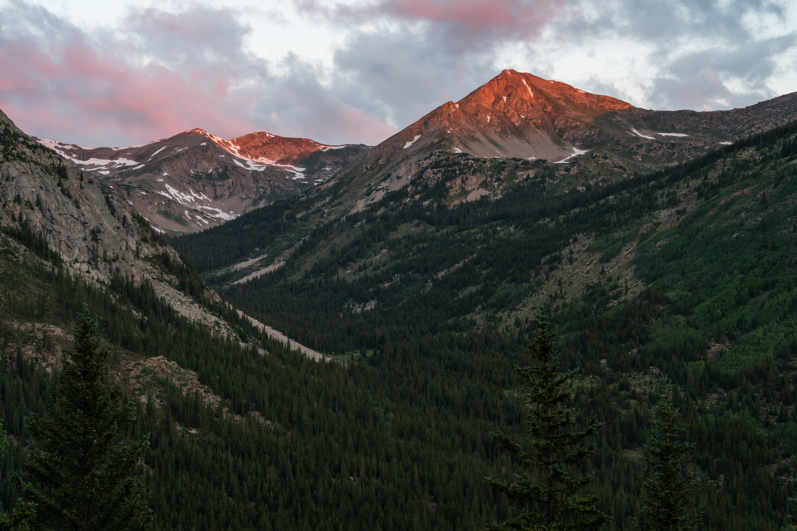 An image depicting the trail Middle Mountain and Huron Peak from Lulu Gulch and its surrounding area.