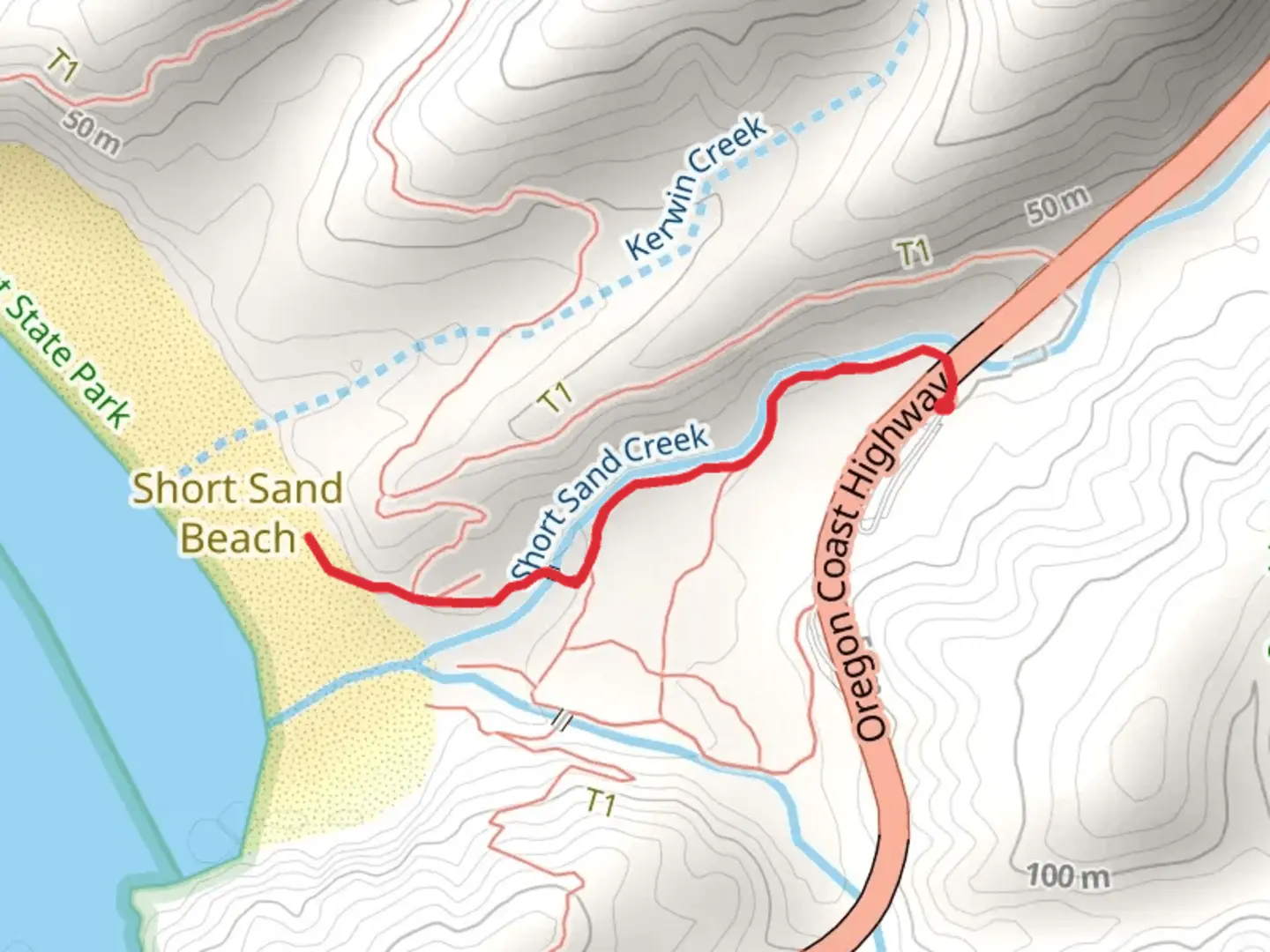 An image depicting the trail Short Sand Beach Trail and its surrounding area.