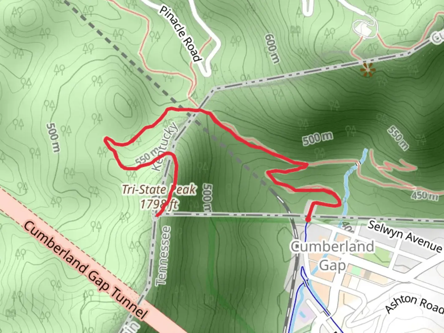 An image depicting the trail Tri-State Peak via Tennessee Road Trail and its surrounding area.