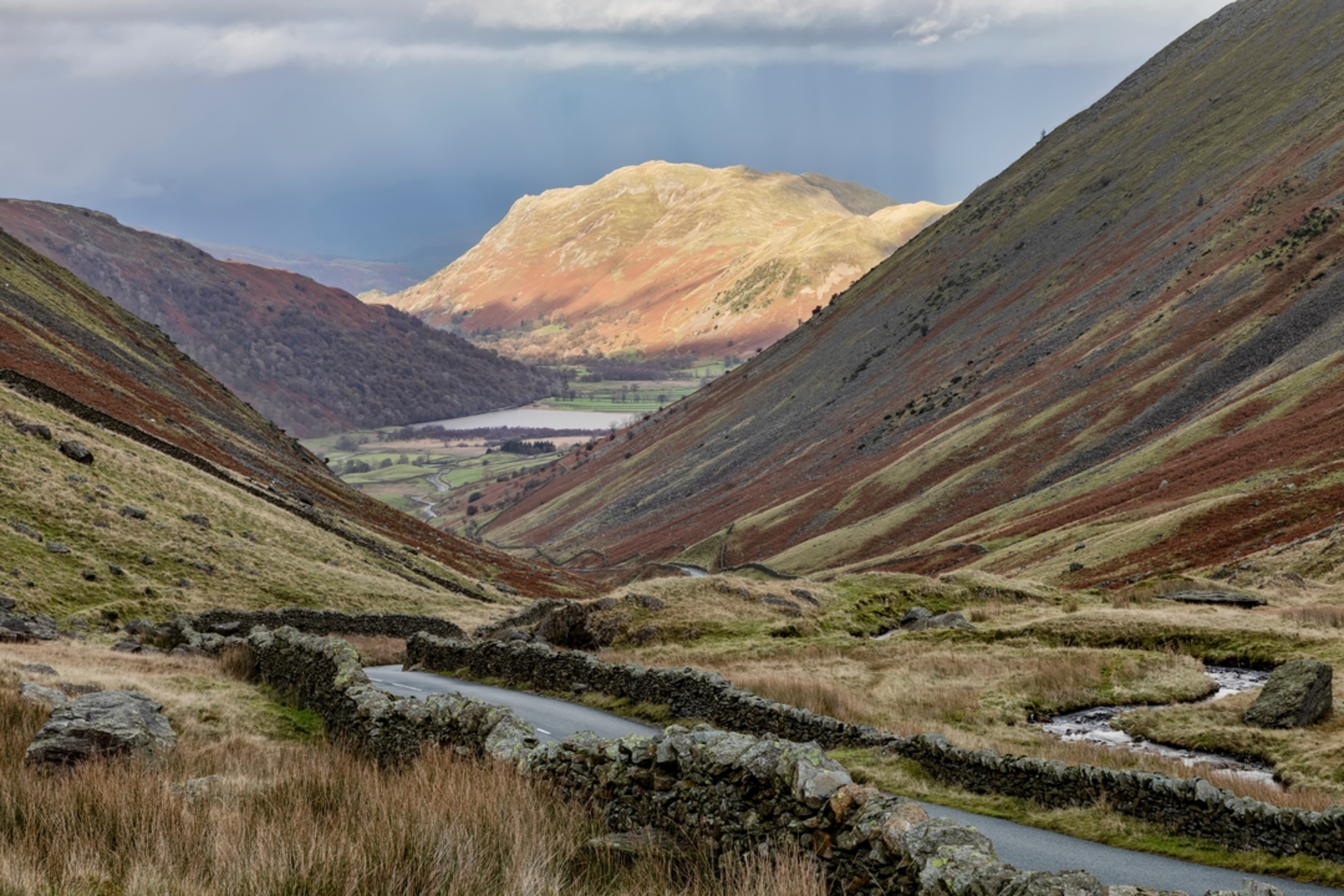 An image depicting the trail Gowbarrow Fell and its surrounding area.