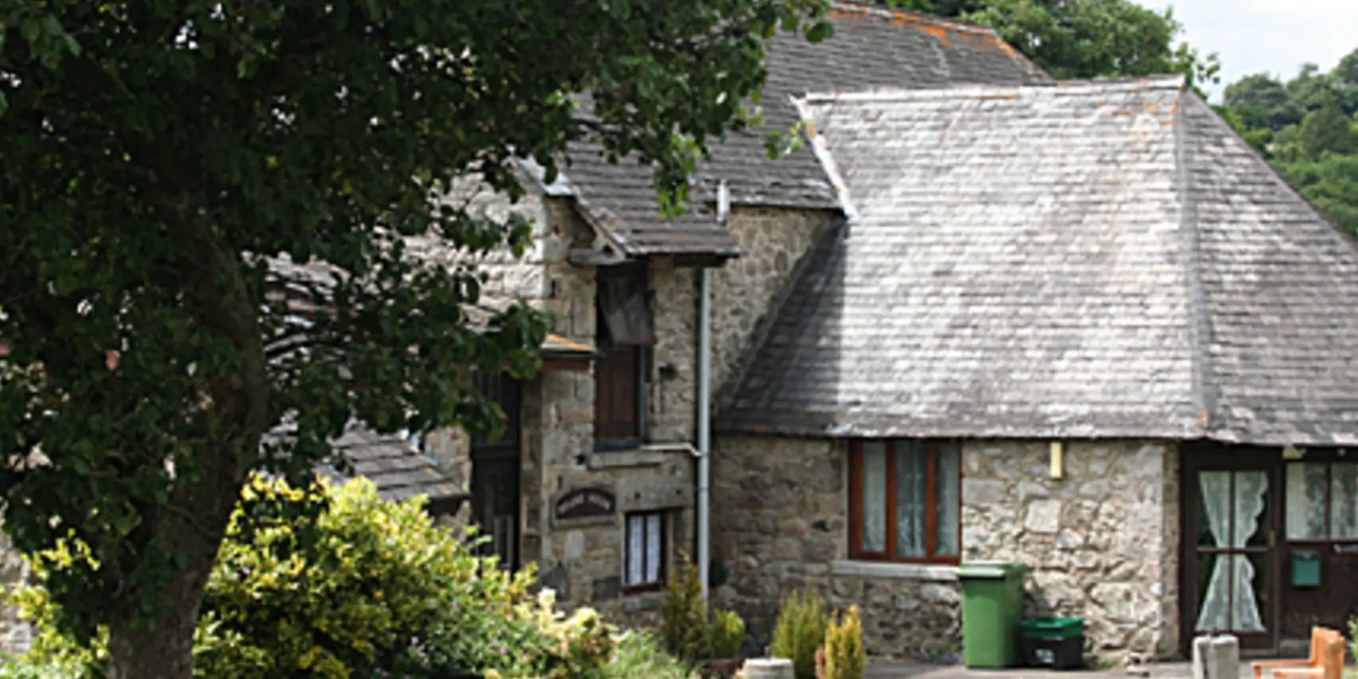 An image depicting the trail Buckland in the Moor Circular and its surrounding area.