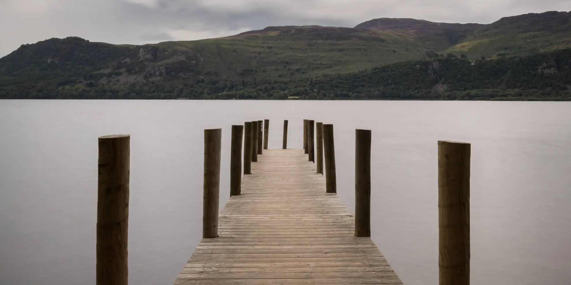 An image depicting the trail Peace How from High Brandelhow Jetty and its surrounding area.