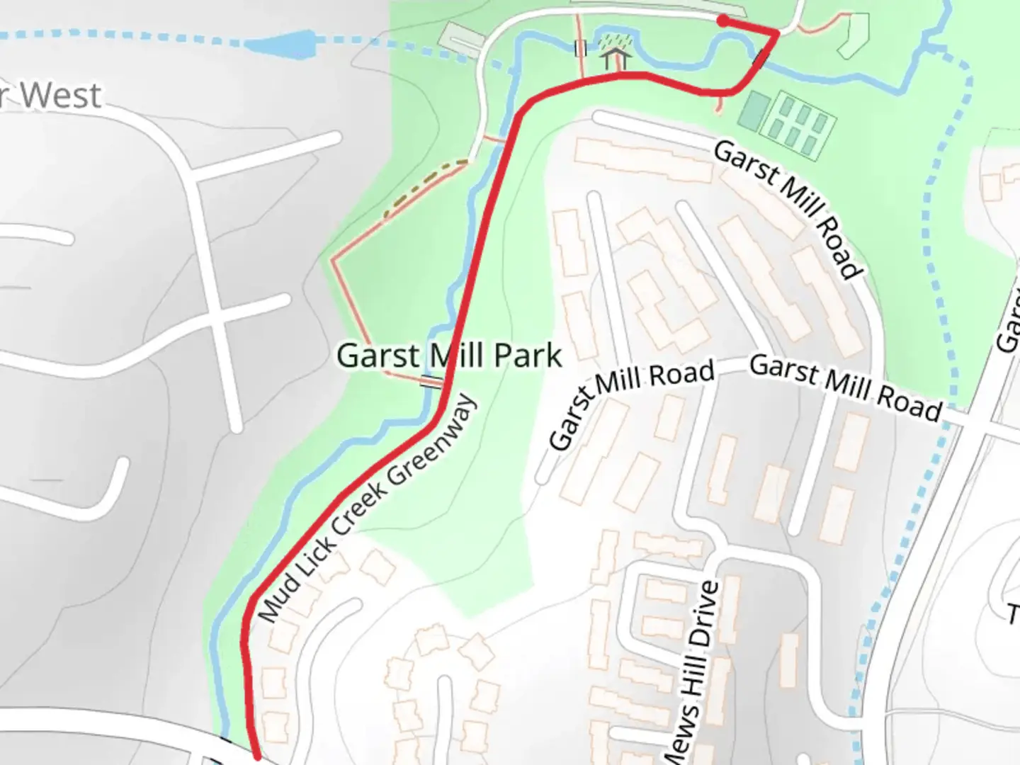 An image depicting the trail Mud Lick Creek Greenway and its surrounding area.
