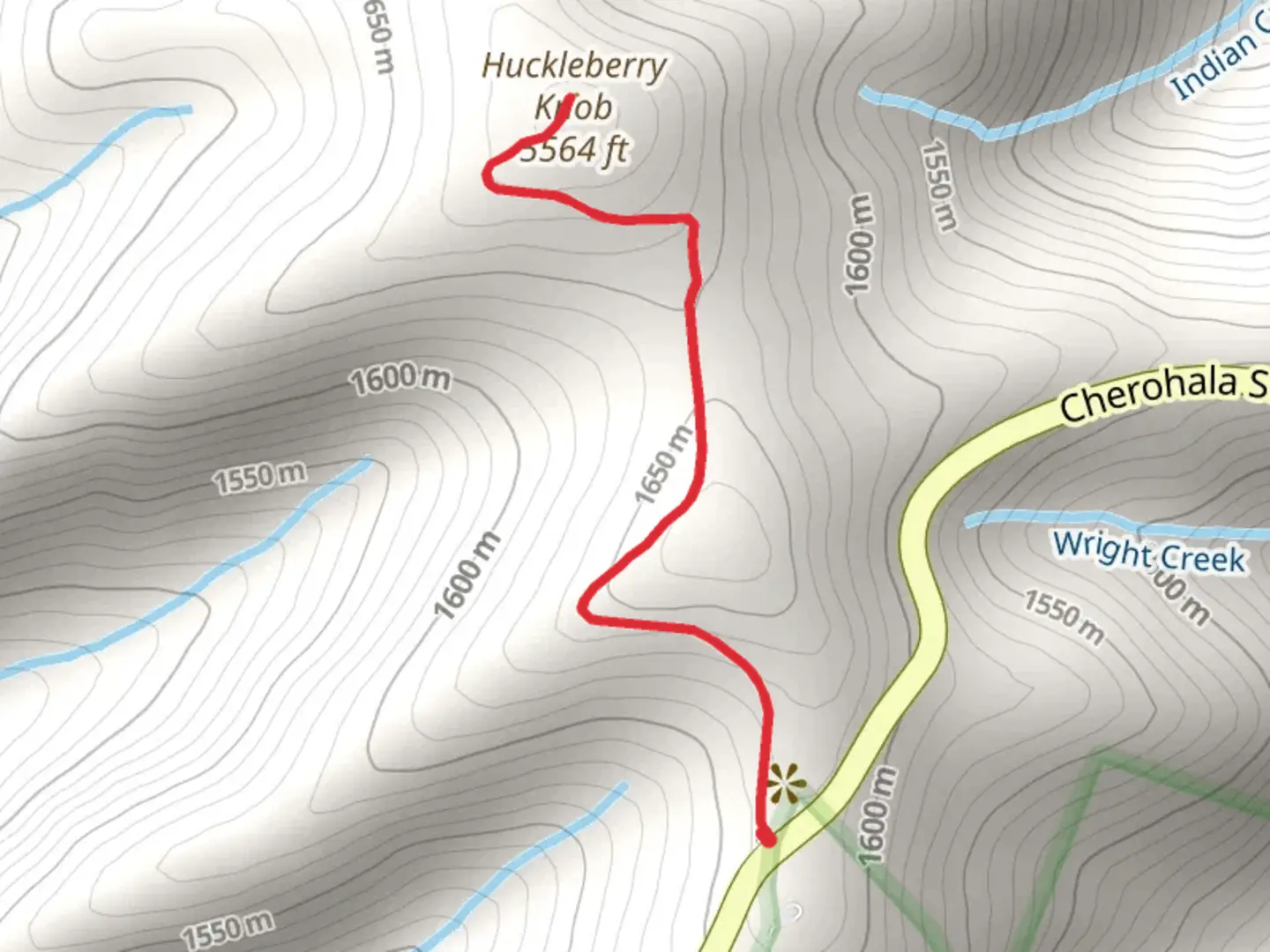 An image depicting the trail Huckleberry Knob Road and its surrounding area.