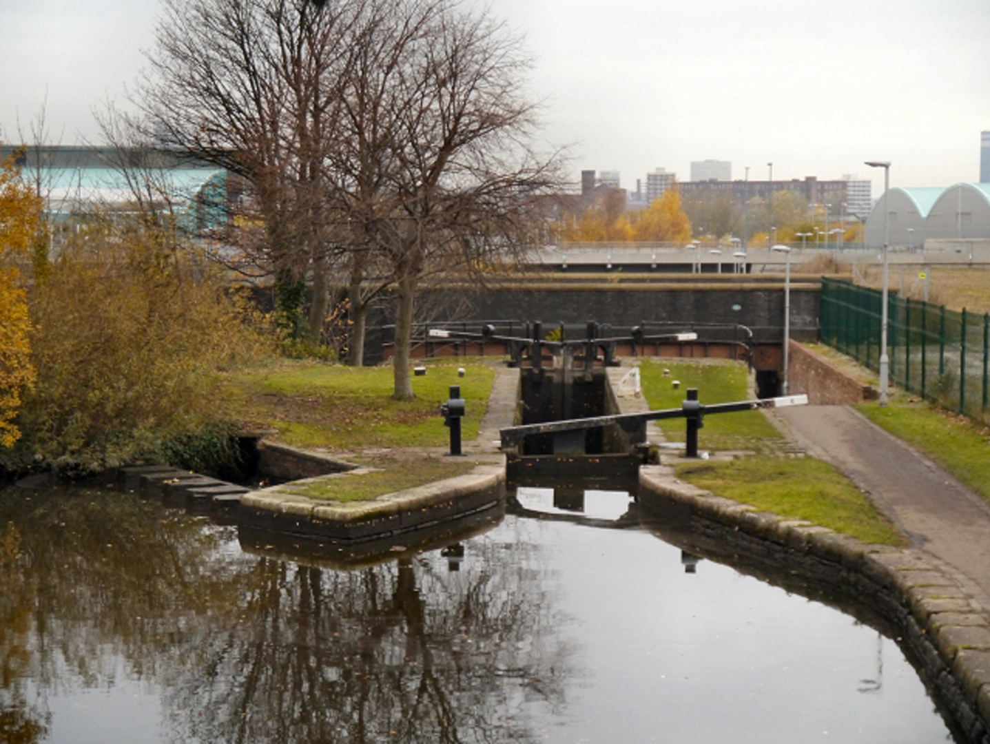 An image depicting the trail Ashton Canal Walk and its surrounding area.
